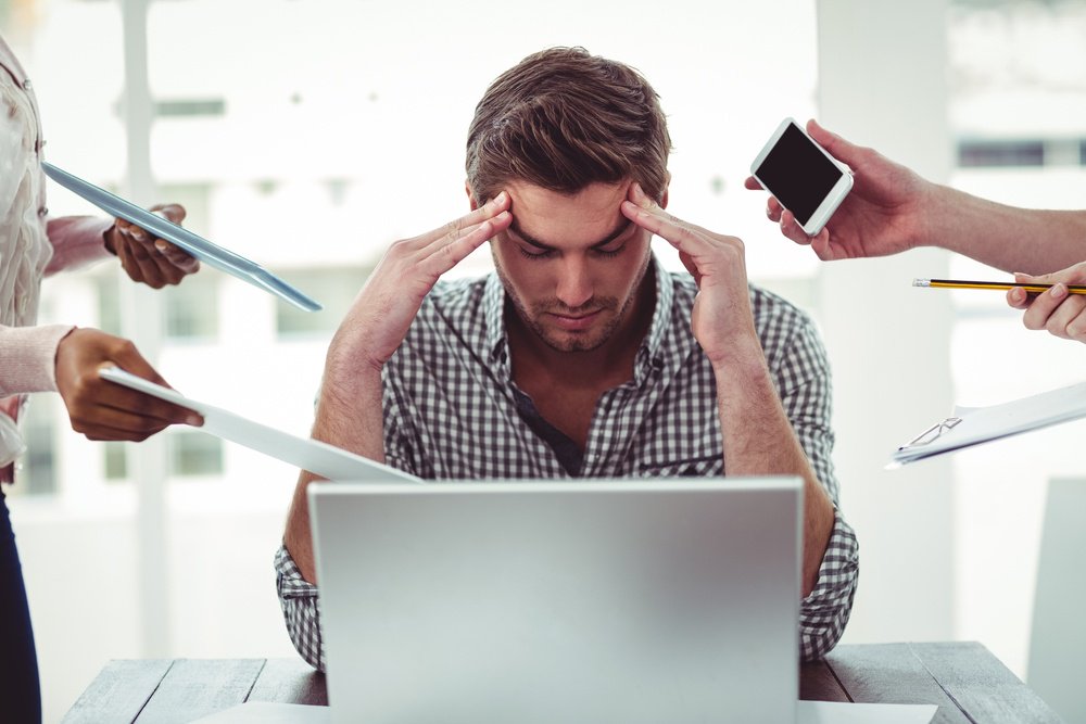 Businessman20stressed20out20at20work20in20casual20office